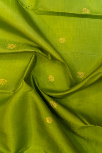 Leave green and peach traditional pure Kanchipuram silk saree