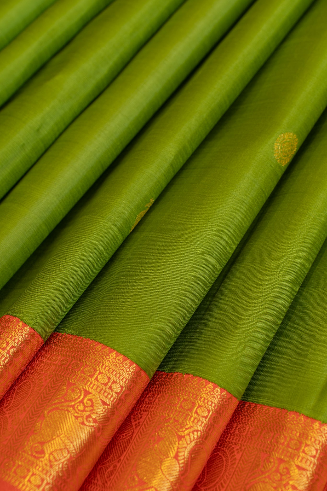 Leave green and peach traditional pure Kanchipuram silk saree