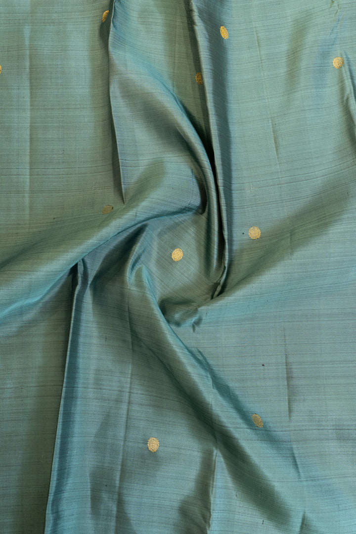 Greenish blue and magenta stripes border pure Kanchipuram silk saree