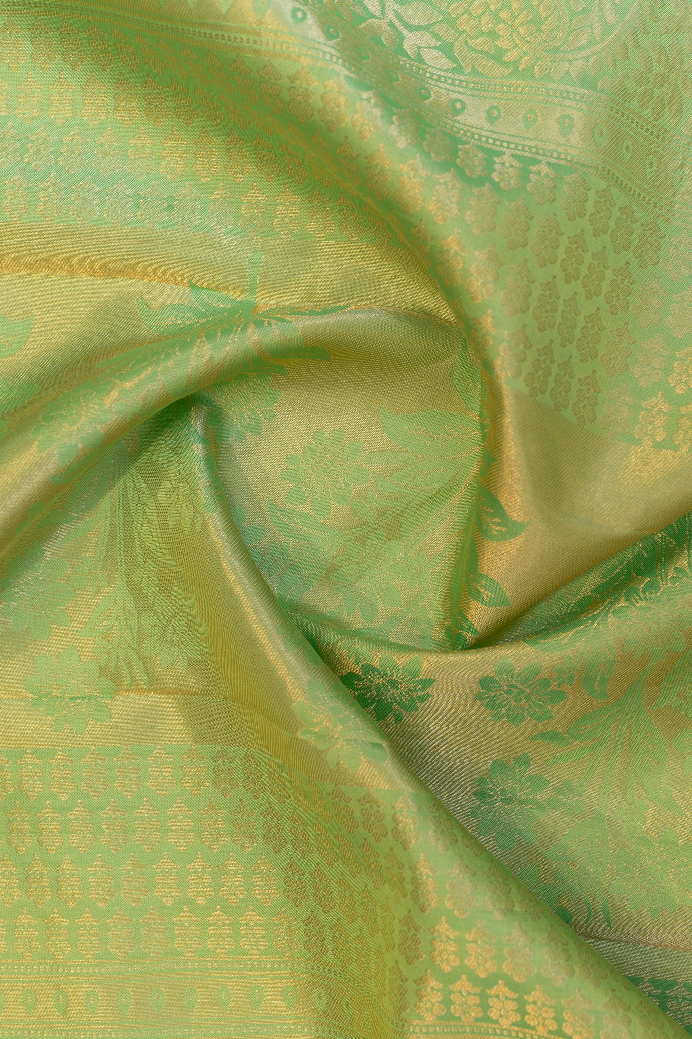 Cyan green embossed brocade pure Kanchipuram silk saree