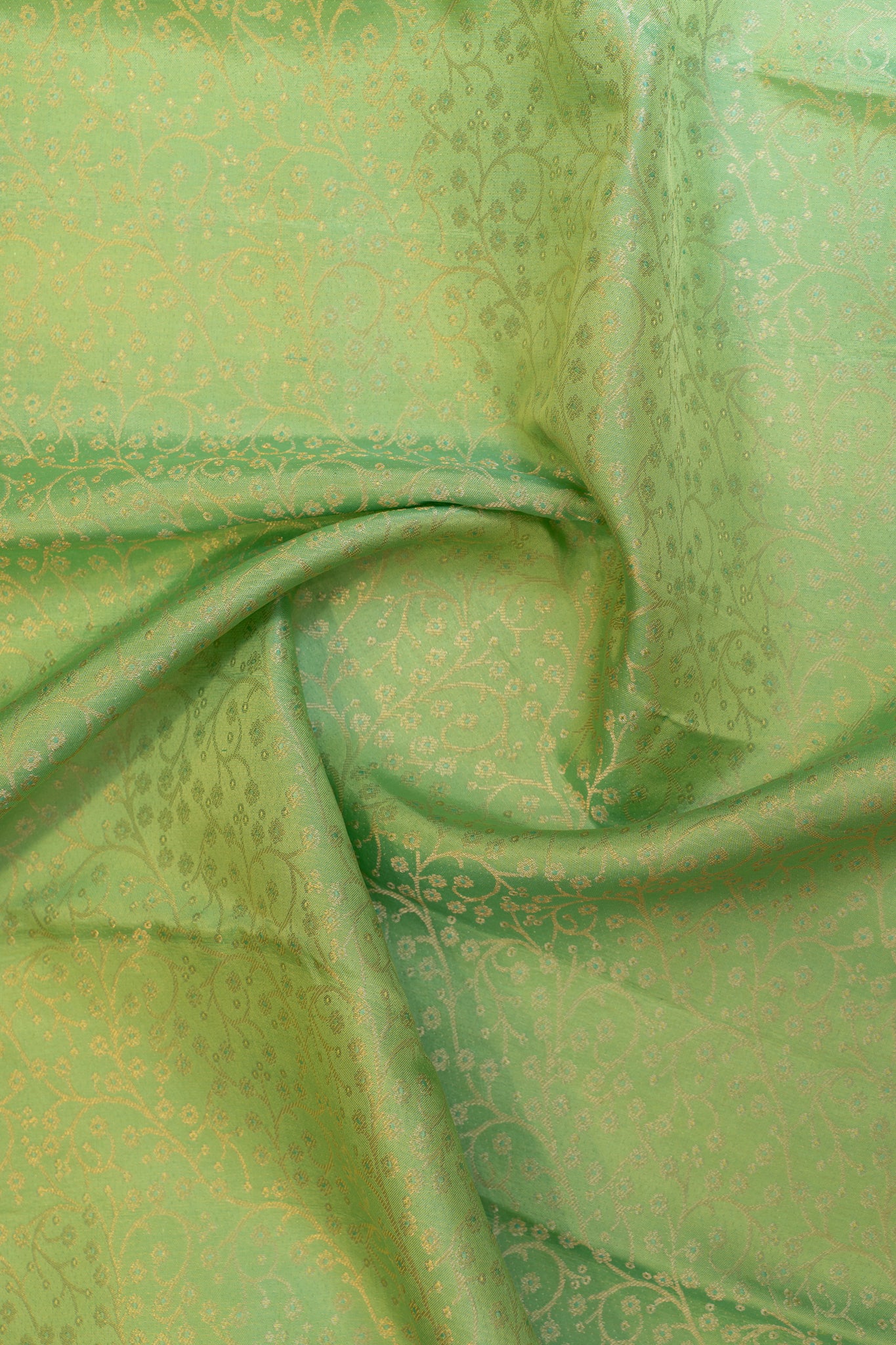 Cyan green embossed brocade pure Kanchipuram silk saree