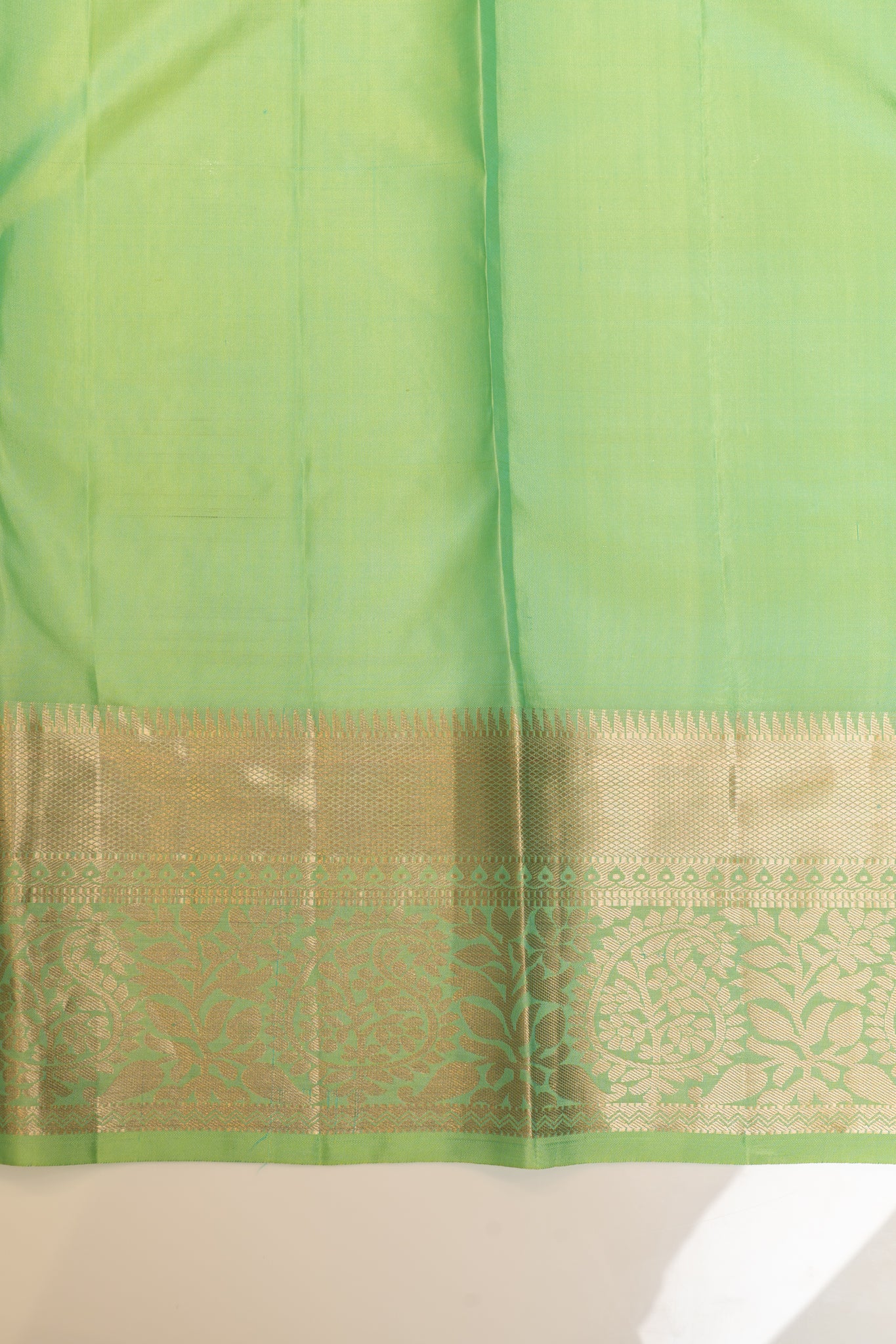 Cyan green embossed brocade pure Kanchipuram silk saree