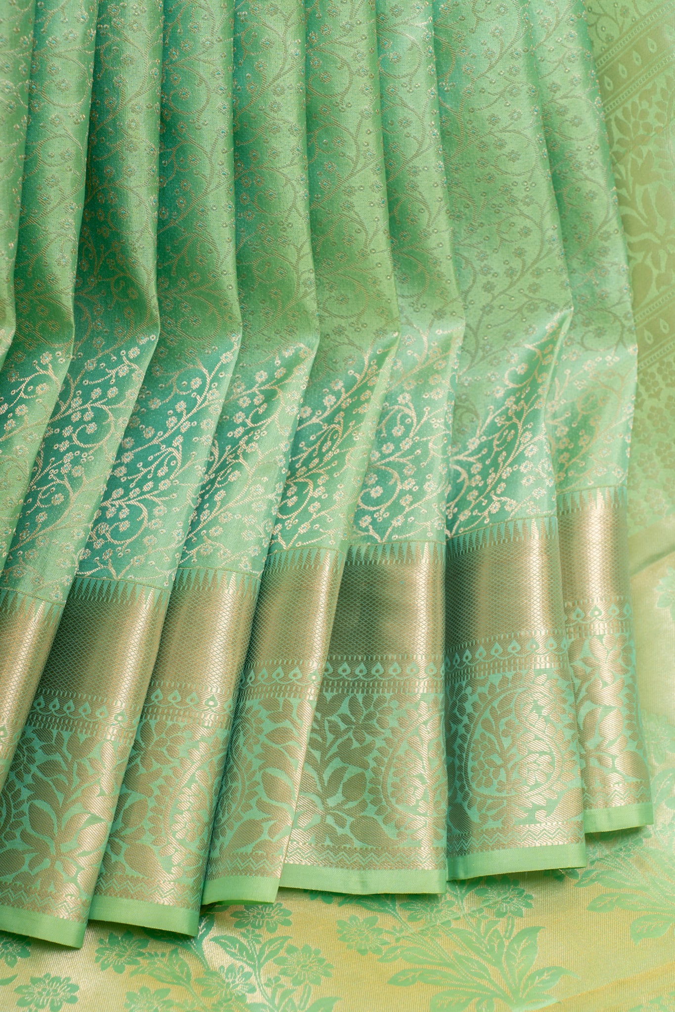 Cyan green embossed brocade pure Kanchipuram silk saree