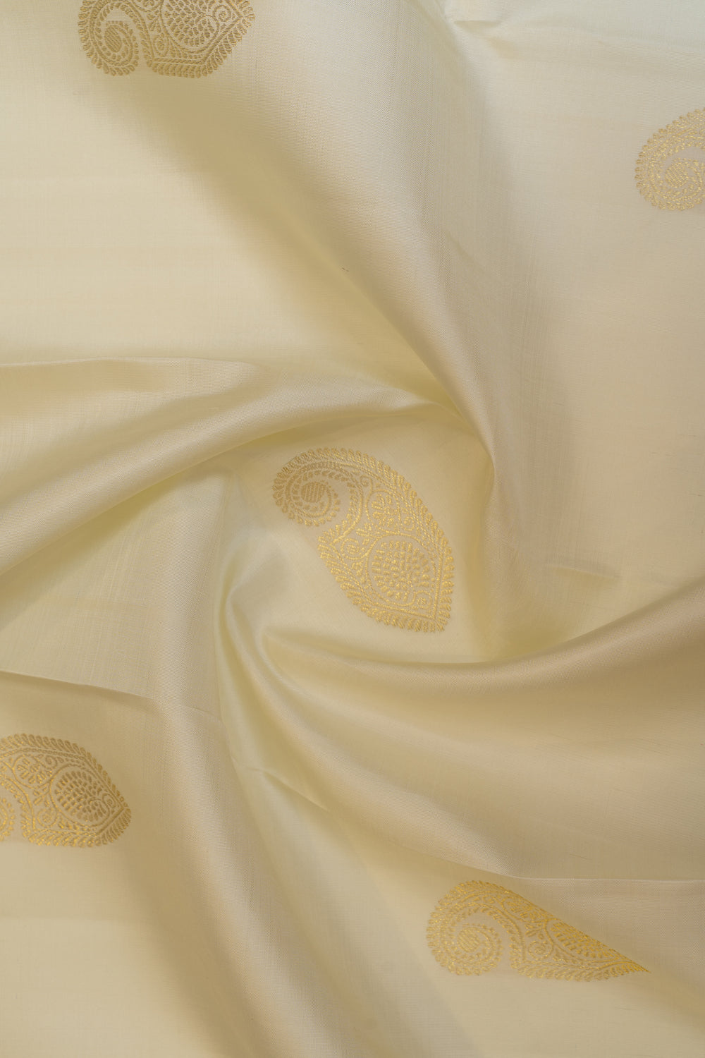 Pearl white and green pure Kanchipuram silk saree