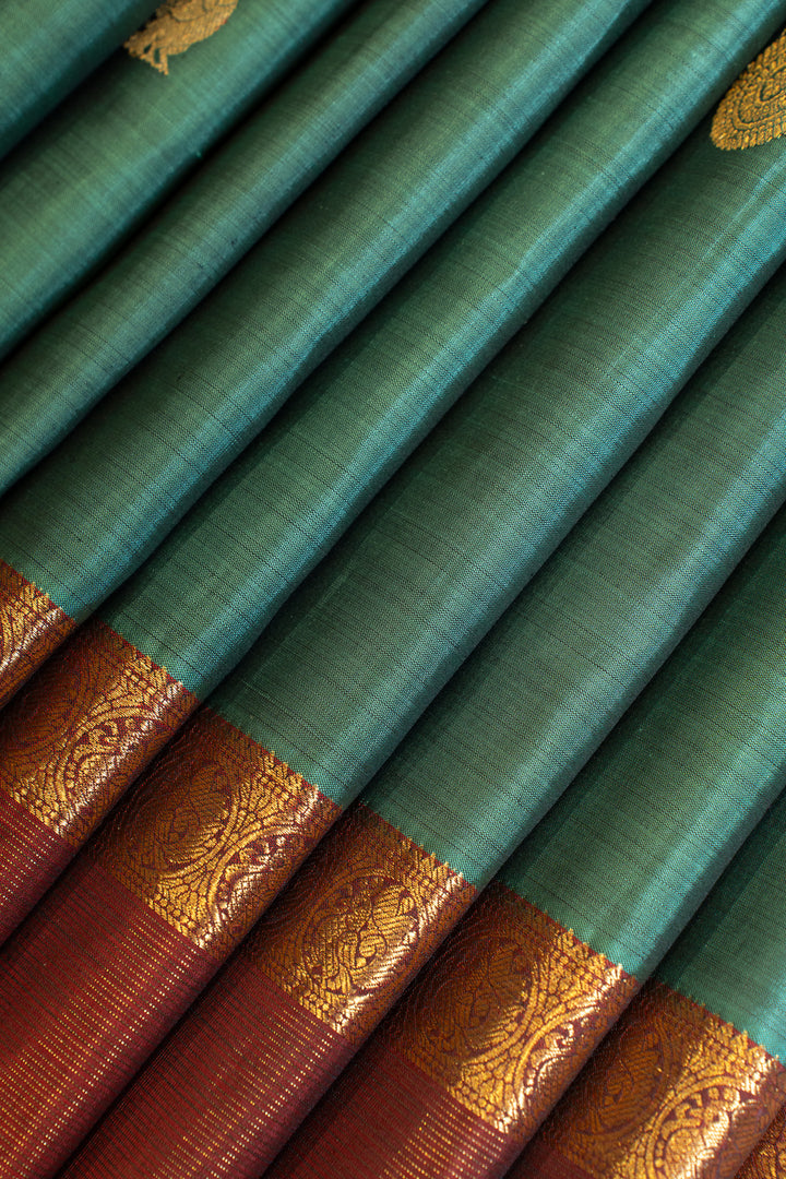 Peacock green and maroon pure Kanchipuram silk saree