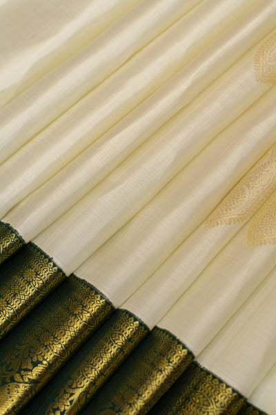 Pearl white and green pure Kanchipuram silk saree