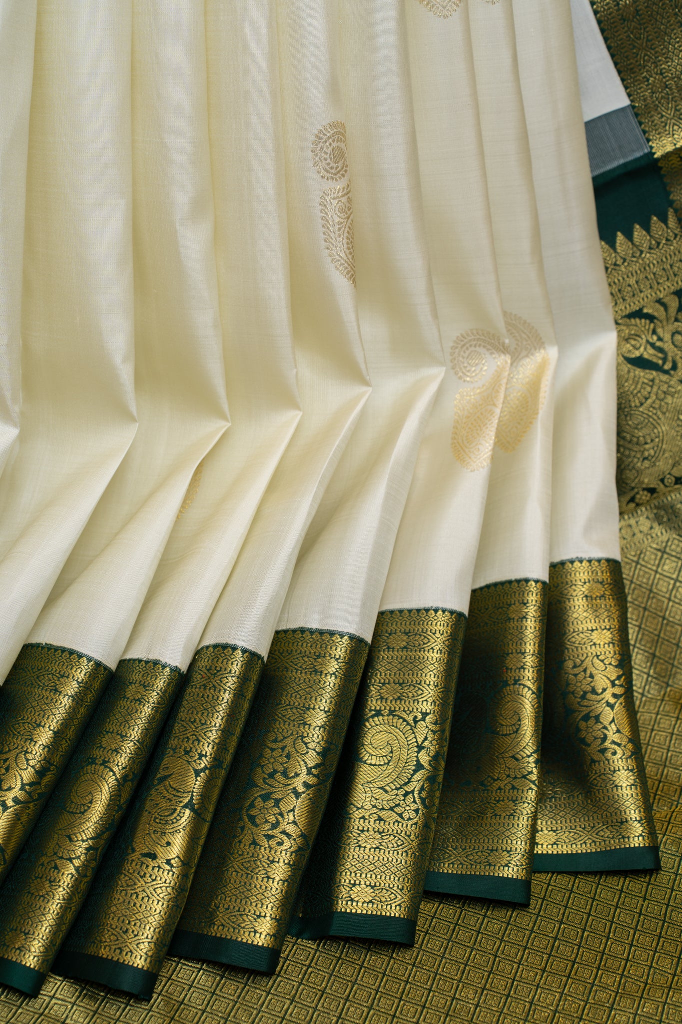 Pearl white and green pure Kanchipuram silk saree