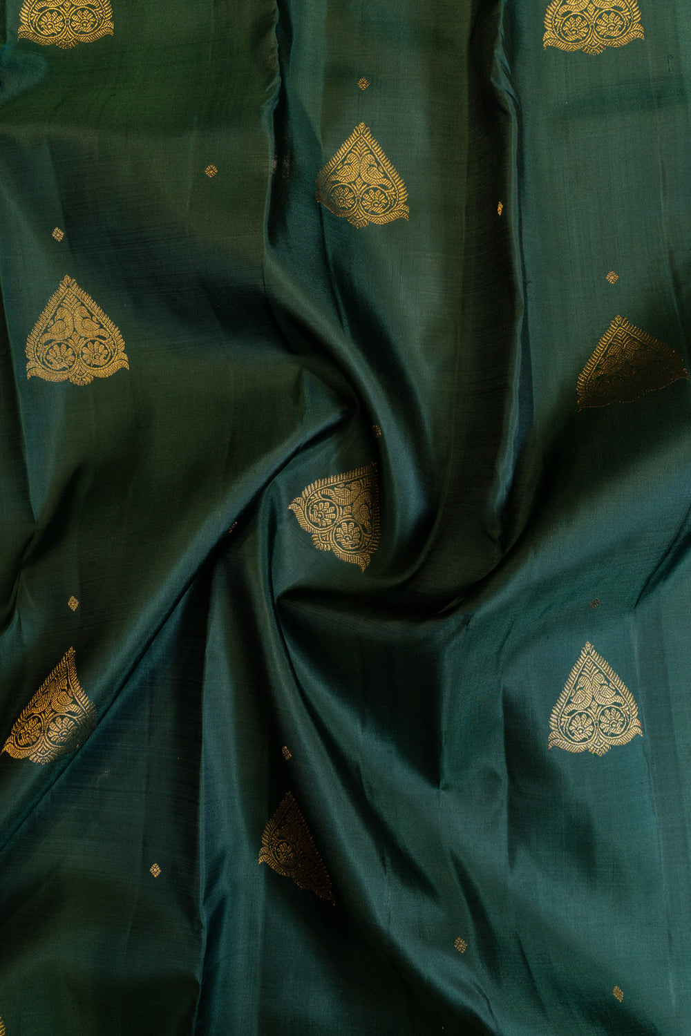Bottle green thilakam motifs pure Kanchipuram silk saree