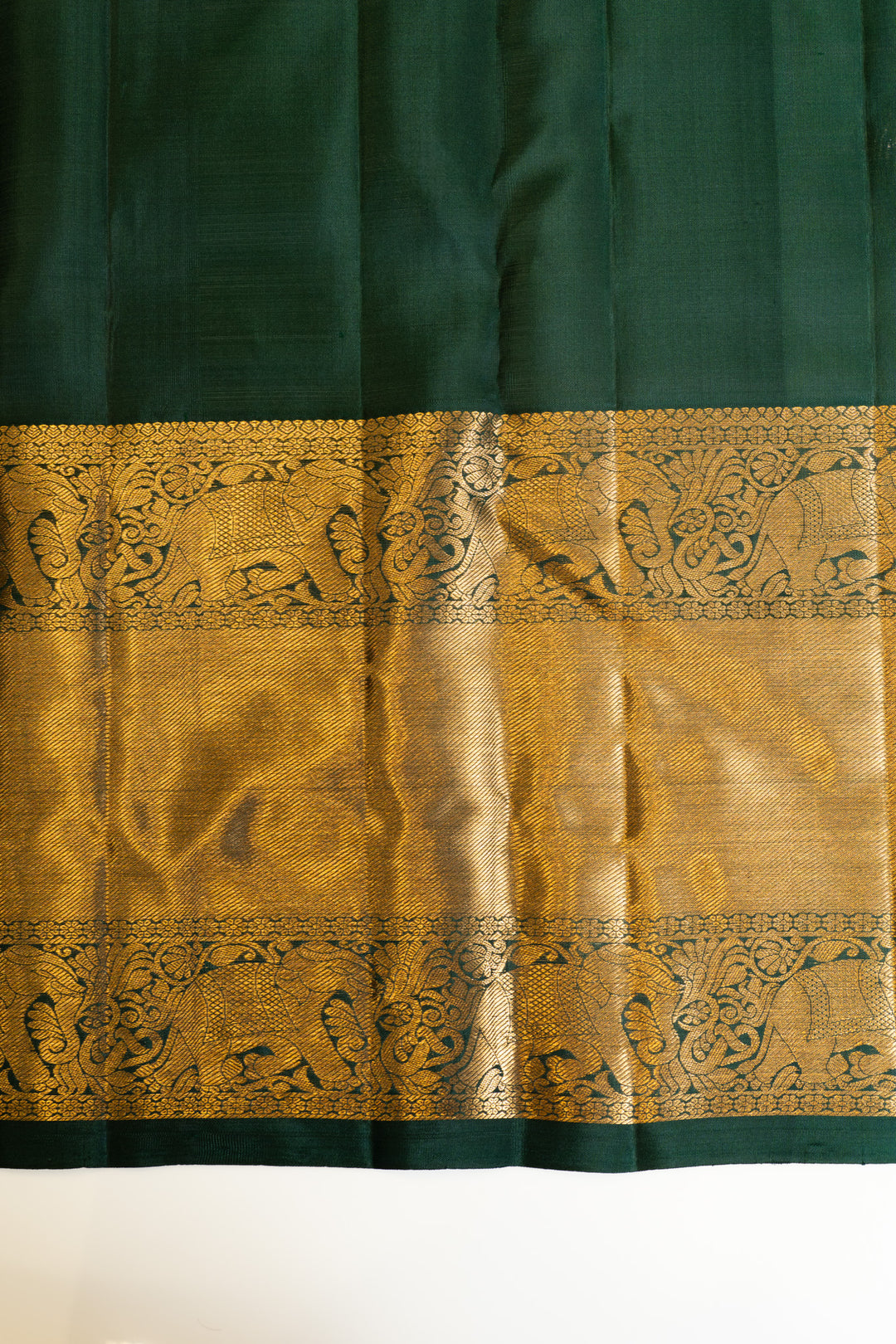 Bottle green thilakam motifs pure Kanchipuram silk saree