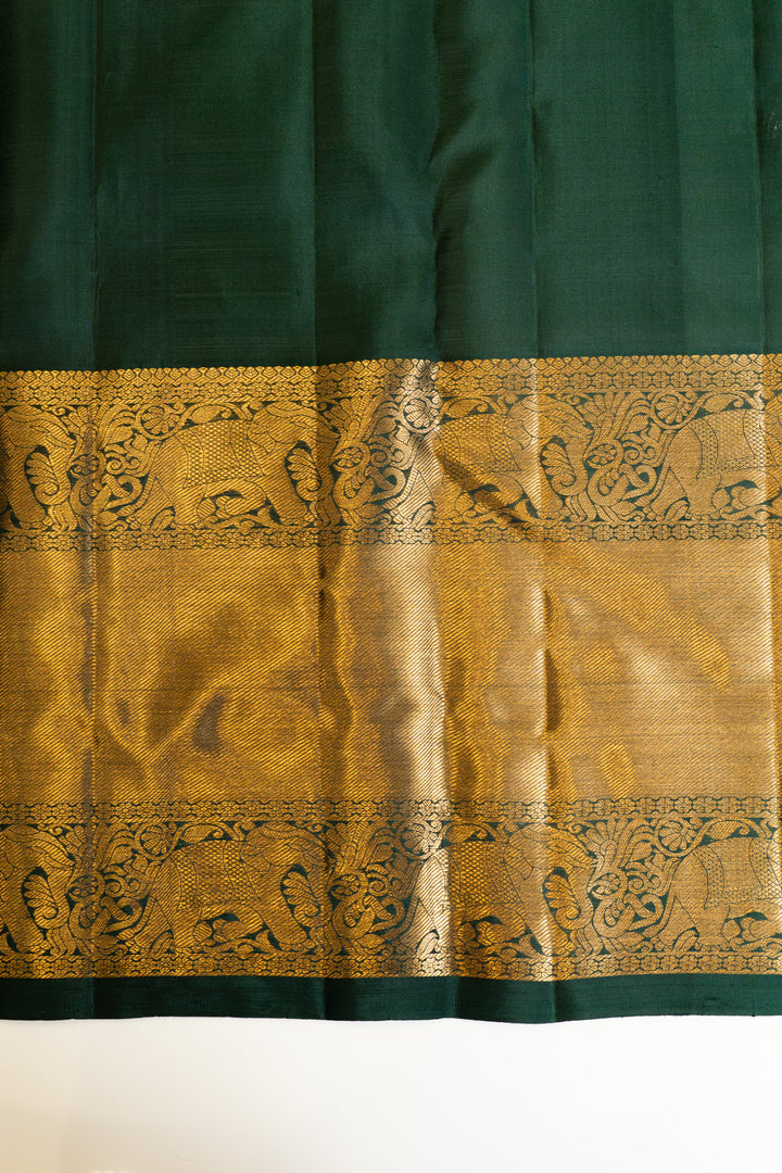 Bottle green thilakam motifs pure Kanchipuram silk saree