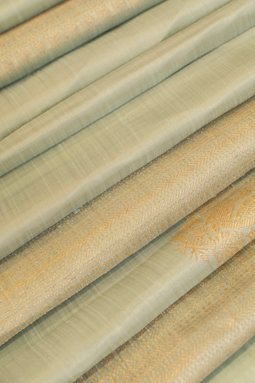 Pastel blue borderless zari stripes pure Kanchipuram silk saree