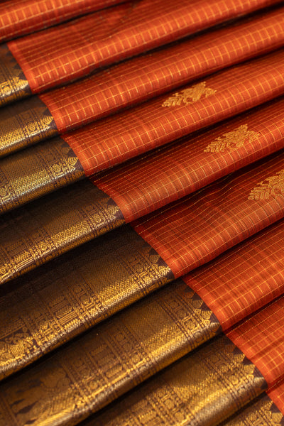 Rust orange zari checks iruthalaipakshi pure Kanchipuram silk saree