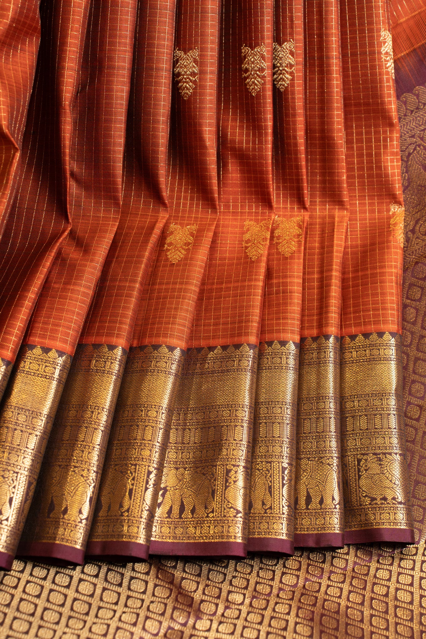 Rust orange zari checks iruthalaipakshi pure Kanchipuram silk saree