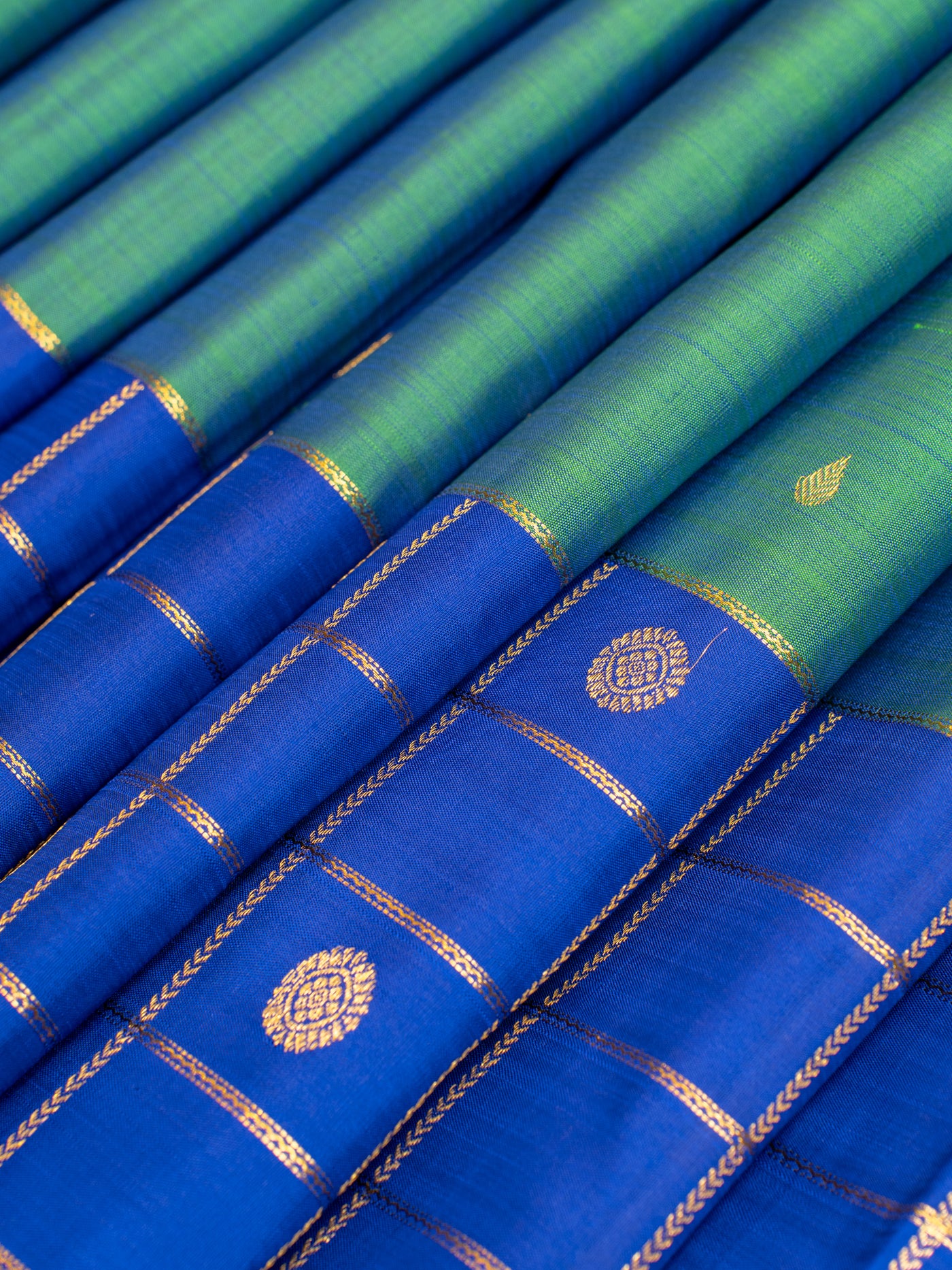 Emerald green and peacock blue pure Kanchipuram silk saree