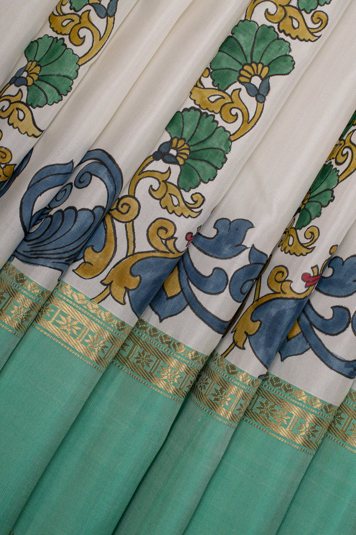Off white and green handpainted pure kanchipuram silk saree