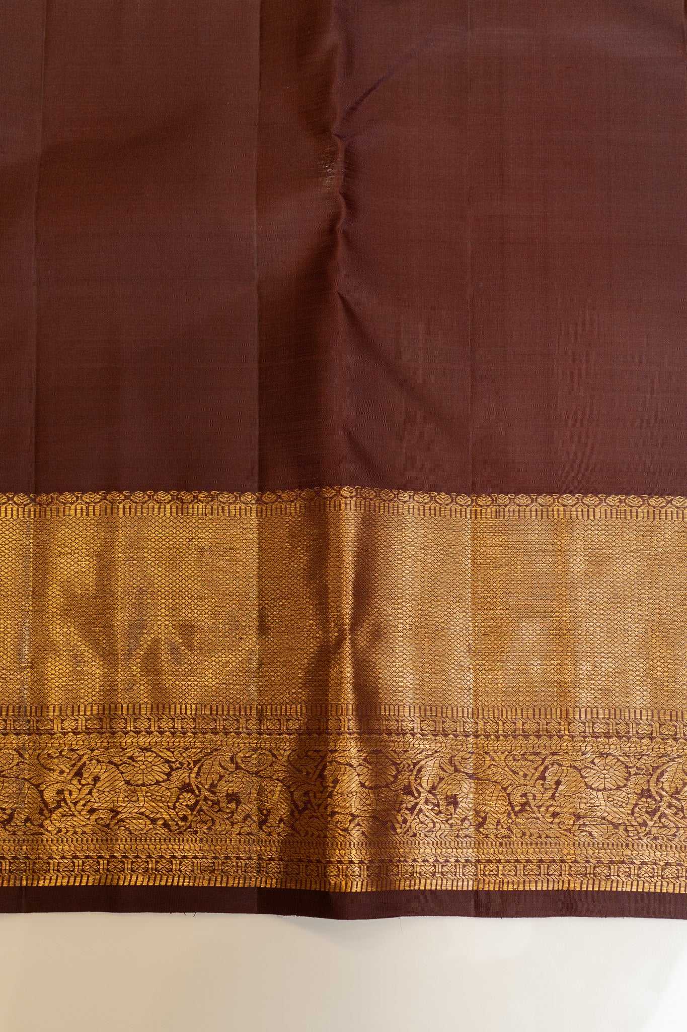 Brown raindrop zari motifs pure Kanchipuram Silk saree