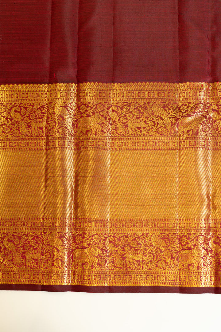 Maroon paisley pure Kanchipuram silk saree