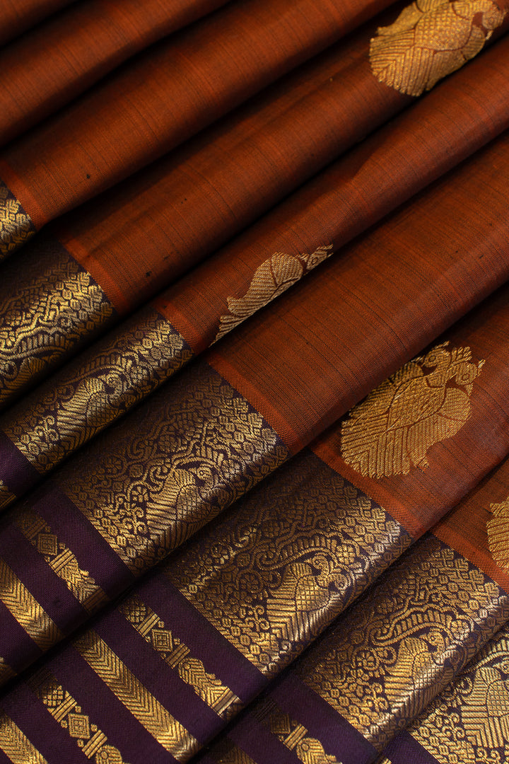 Rust maroon iruthalaipakshi pure Kanchipuram silk saree