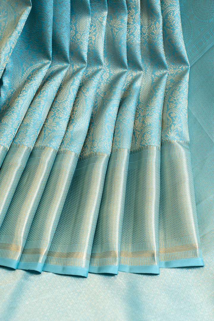 Pastel blue paisley pure Kanchipuram silk saree