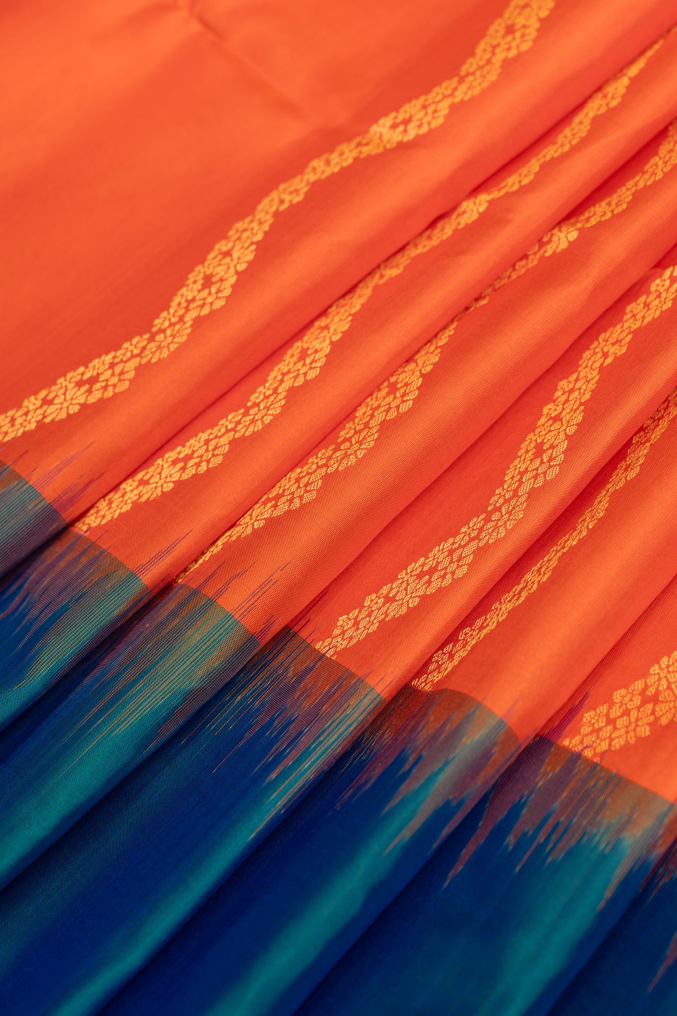 Orange and peacock blue Serpentine stripes pure soft silk saree