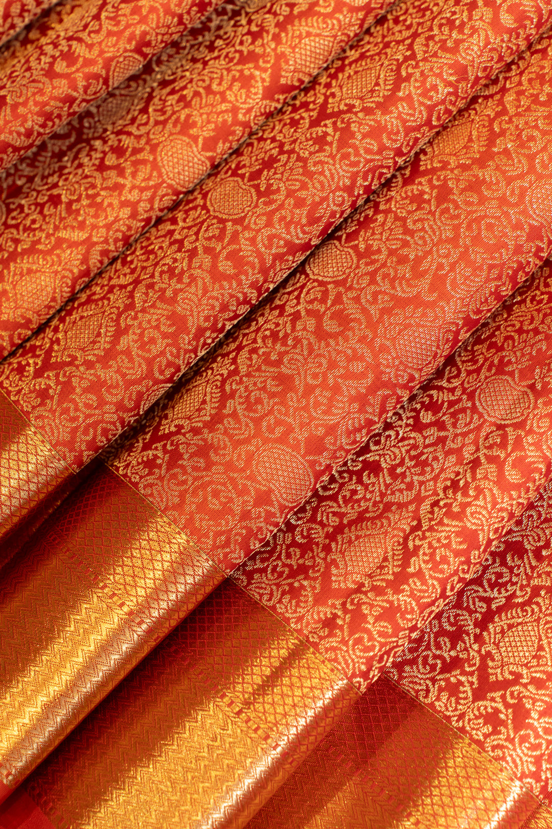 Sunset orange brocade pure Kanchipuram silk saree