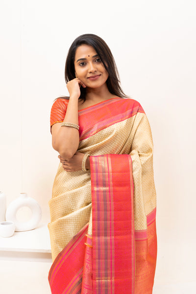 Ivory and Peach Pure Zari Kanchipuram Silk Saree - Clio Silks