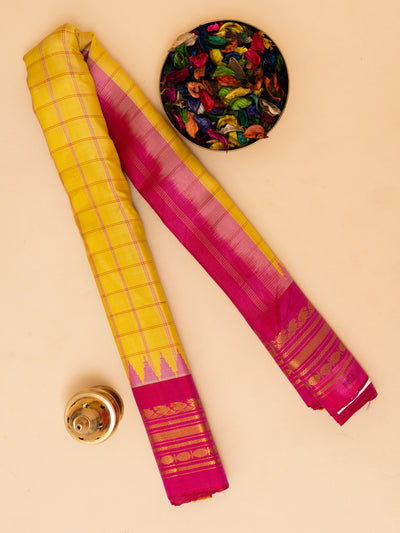 Yellow check and magenta pure Gadwal silk saree