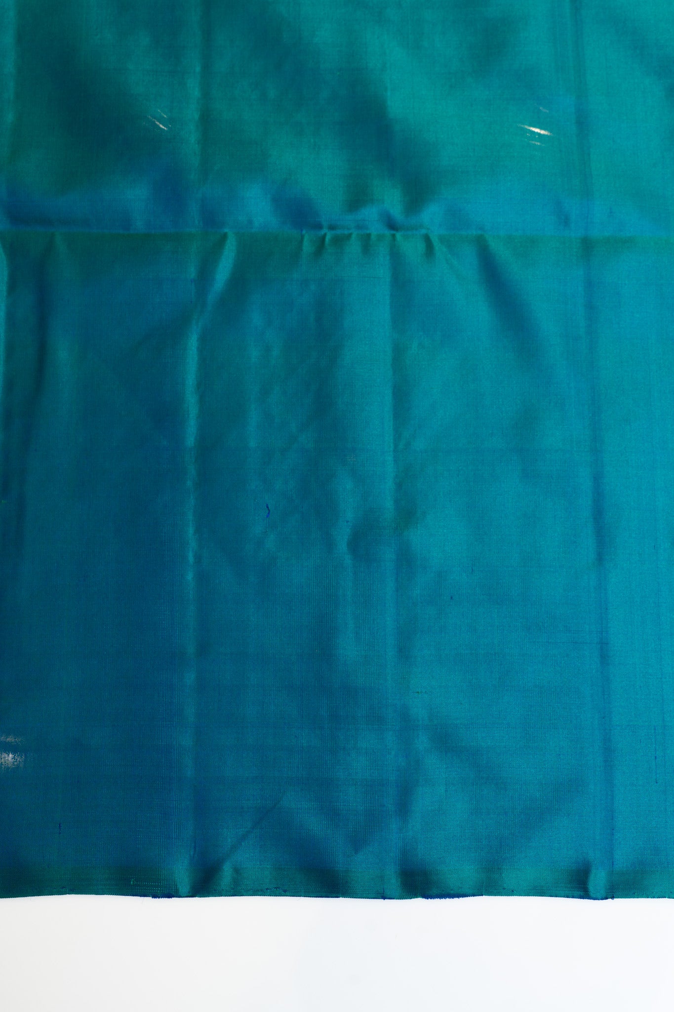 Beige and peacock blue serpentine stripes pure soft silk saree