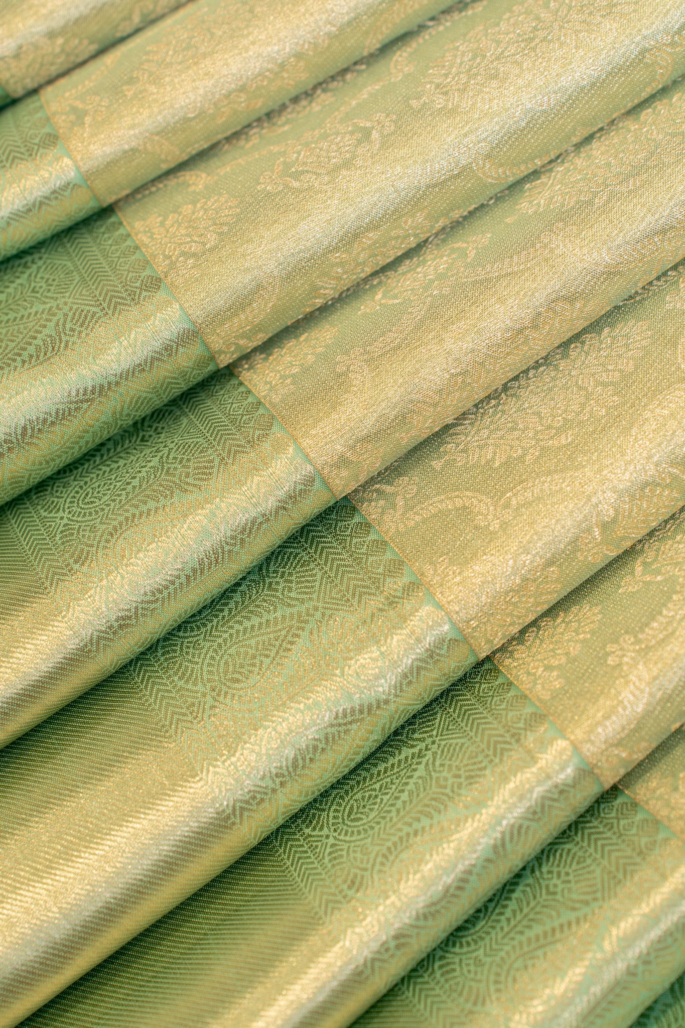 Pastel green floral tissue brocade pure Kanchipuram silk saree