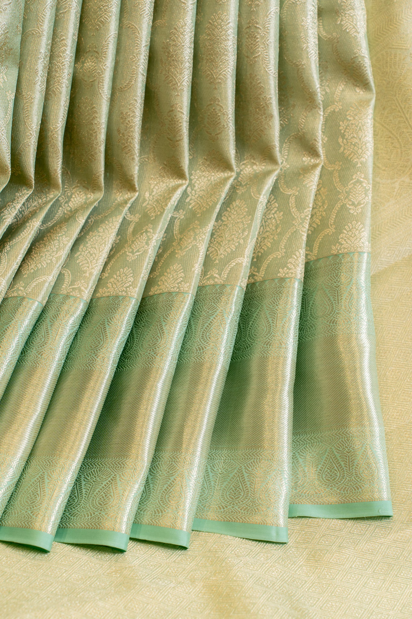 Pastel green floral tissue brocade pure Kanchipuram silk saree