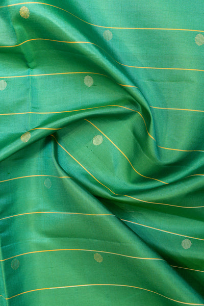 Teal green polka zari pure soft silk saree