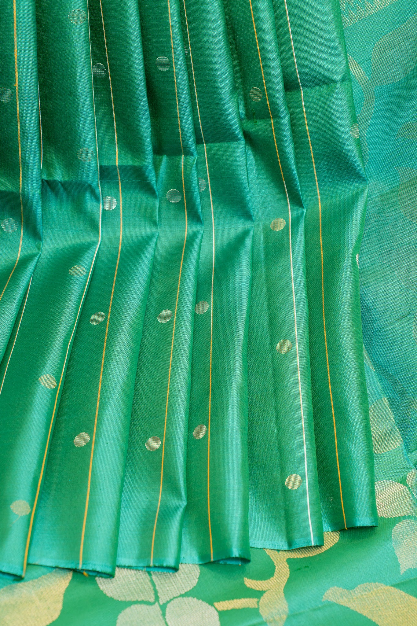 Teal green polka zari pure soft silk saree