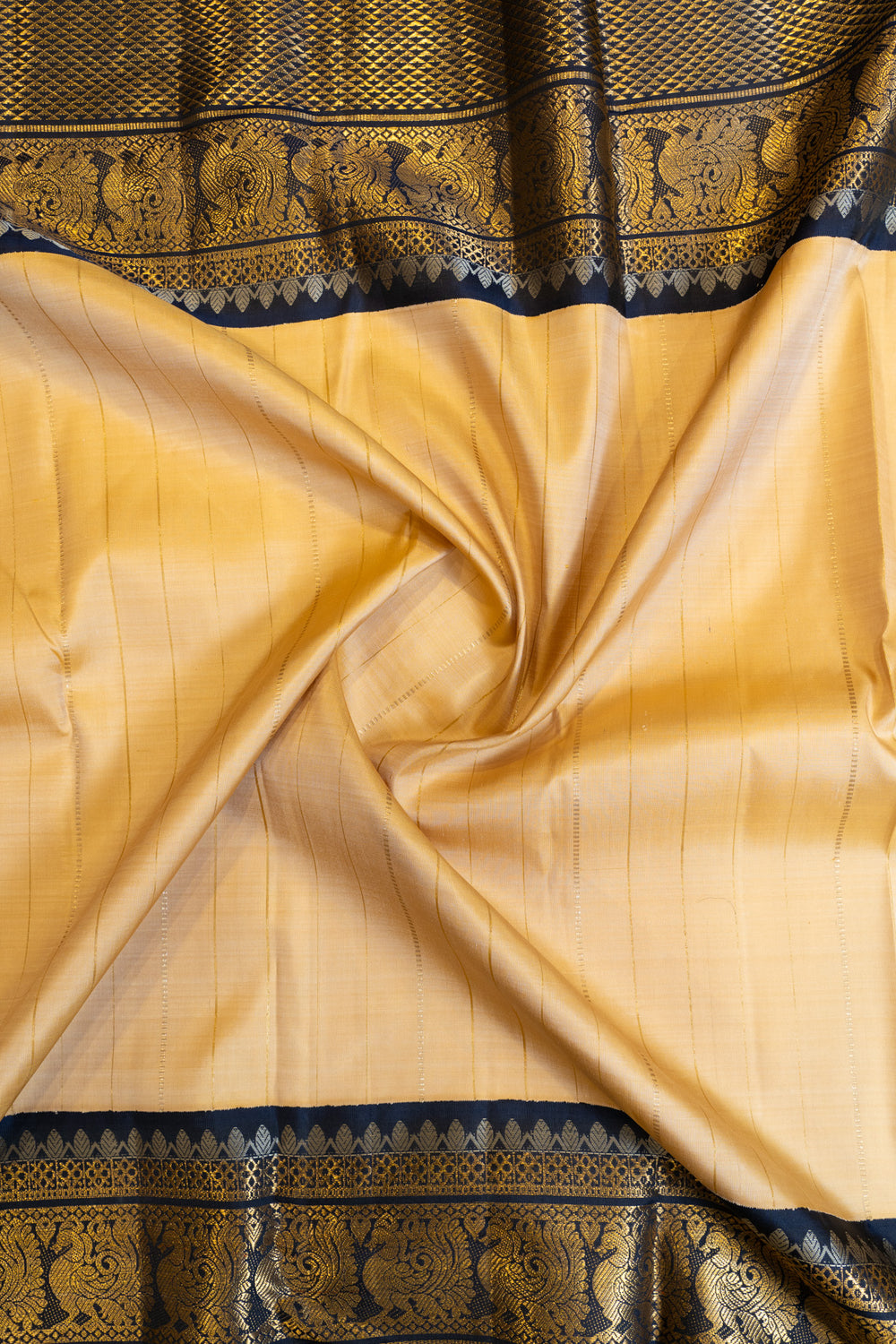 Sand beige and blue grand borders pure Kanchipuram silk saree
