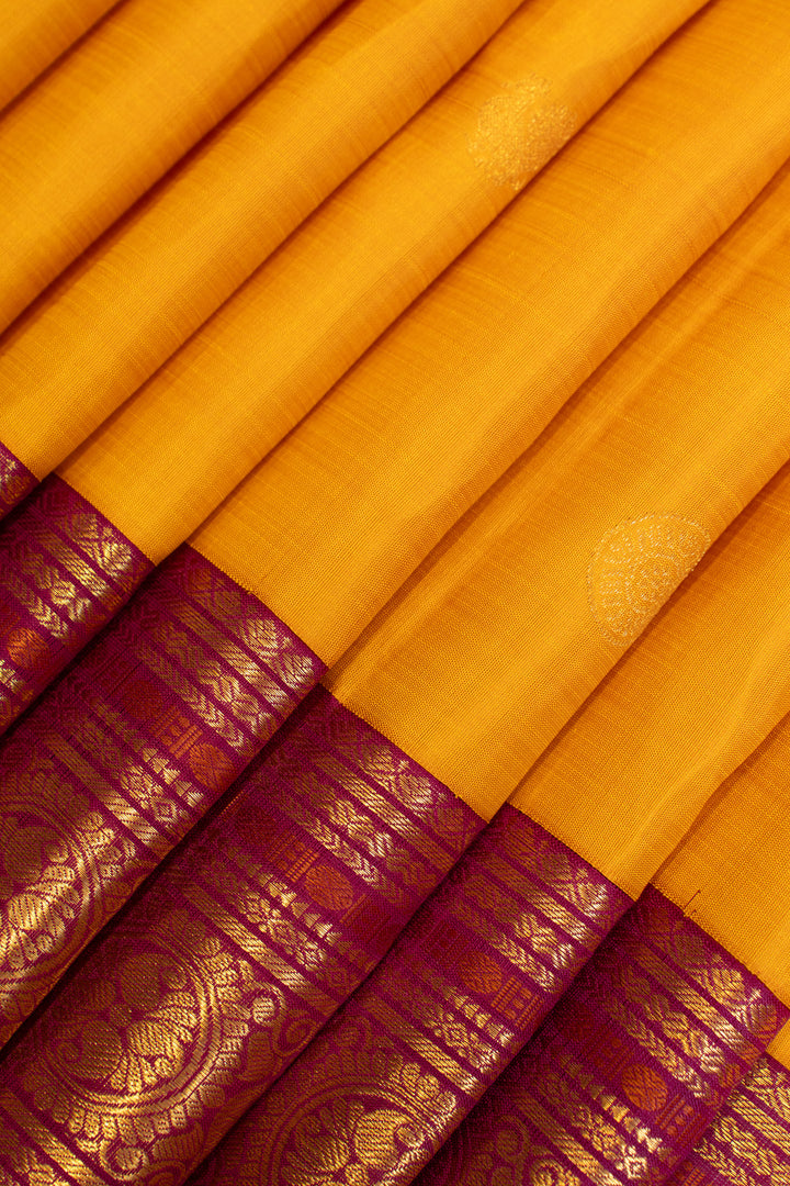 Yellow and magenta traditional pure Kanchipuram silk saree