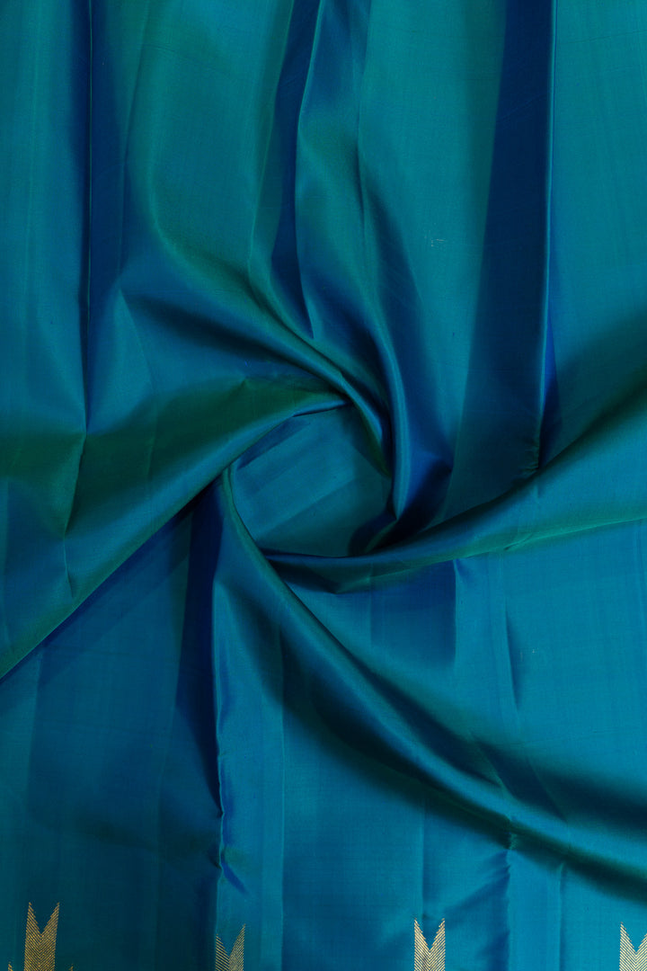 Peacock blue temple border pure Kanchipuram silk saree
