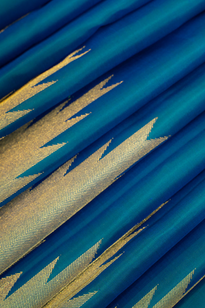 Peacock blue temple border pure Kanchipuram silk saree