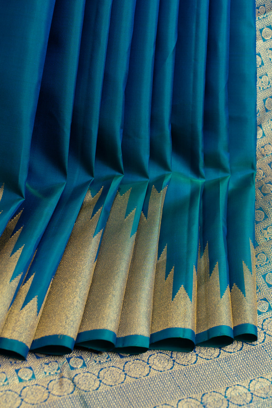 Peacock blue temple border pure Kanchipuram silk saree