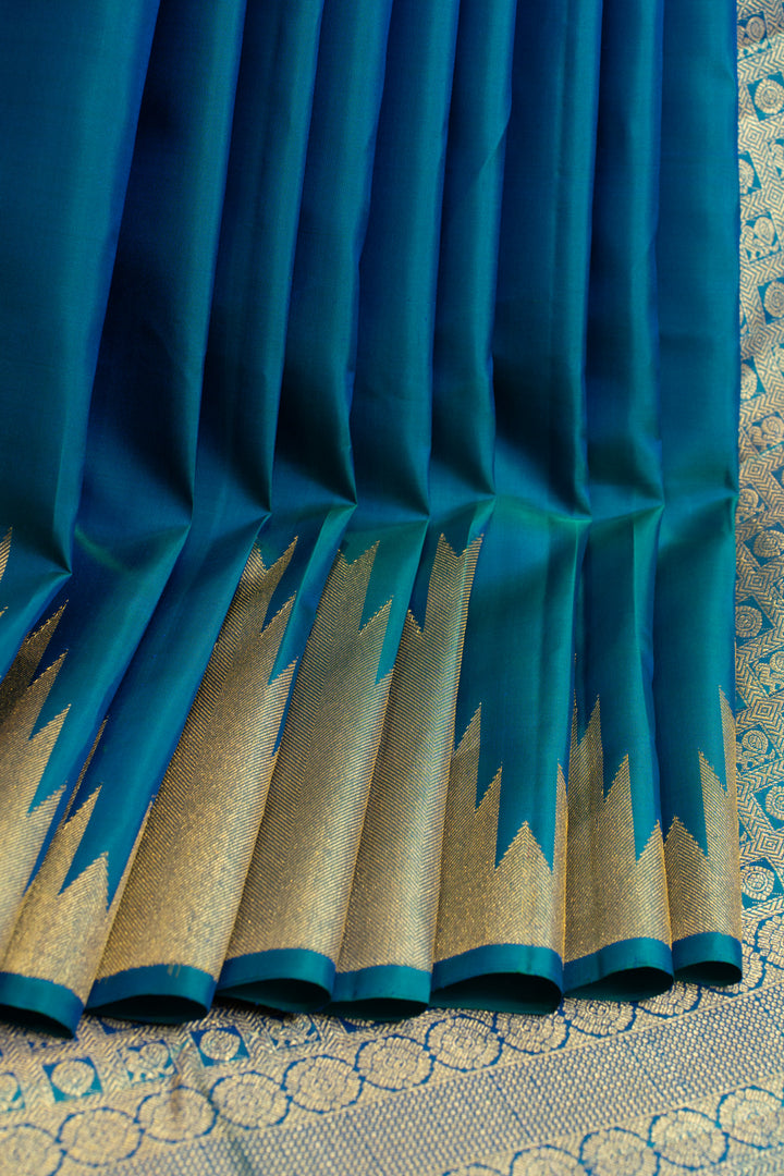 Peacock blue temple border pure Kanchipuram silk saree