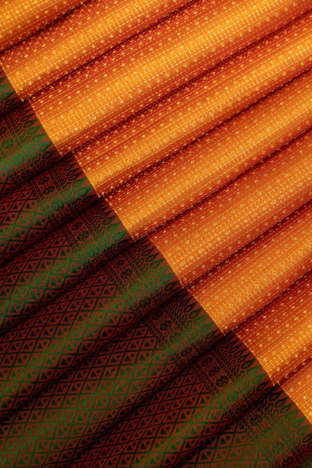 Rust orange and mandhulir green Muthu zari pure Kanchipuram silk saree