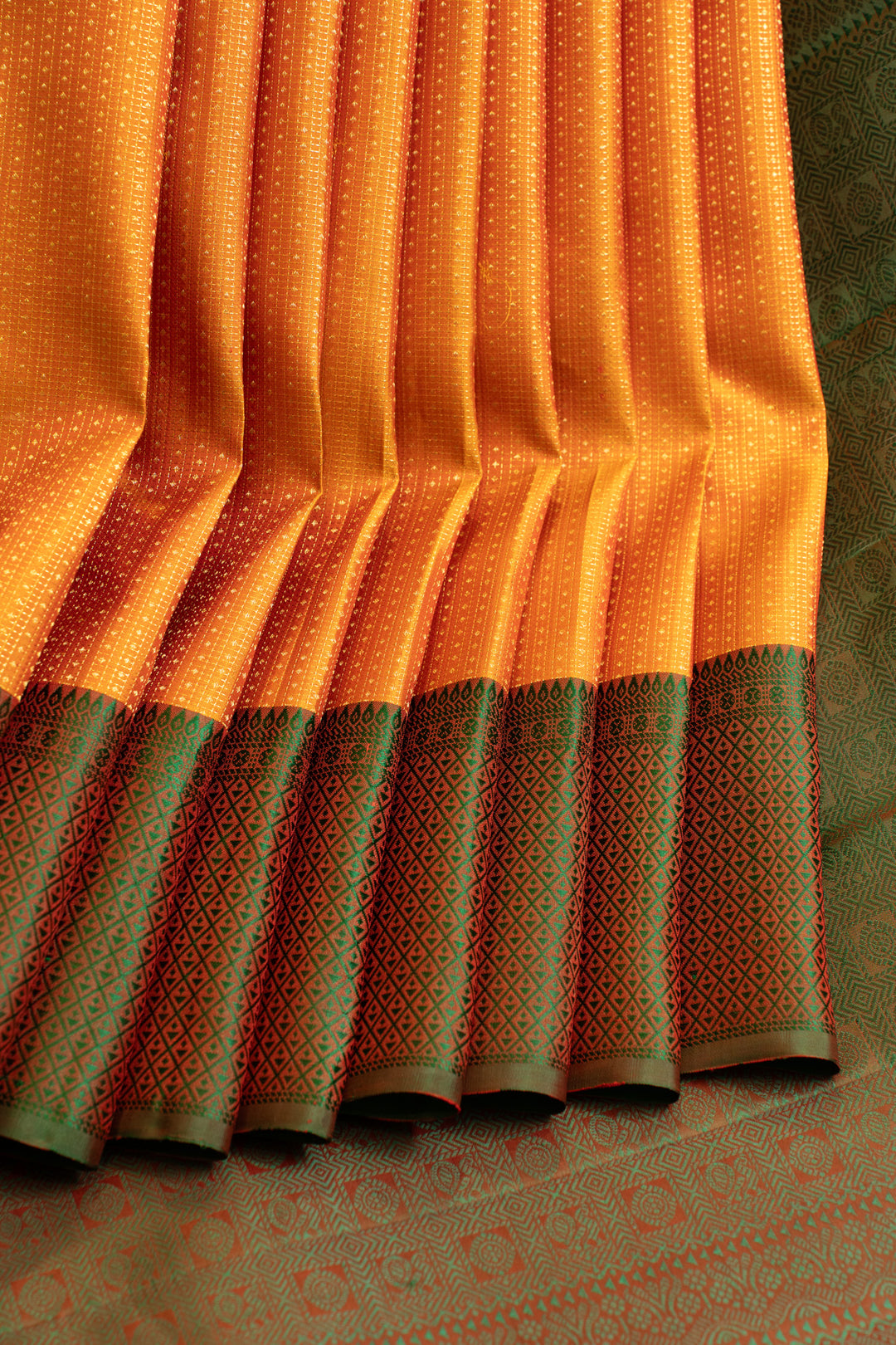 Rust orange and mandhulir green Muthu zari pure Kanchipuram silk saree