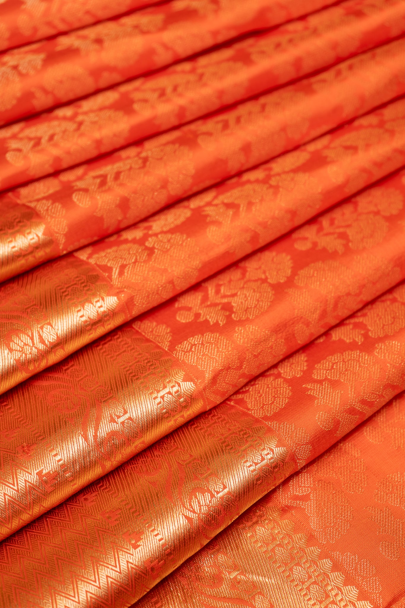 Orange Floral Zari Brocade Kanchipuram Silk Saree - Clio Silks