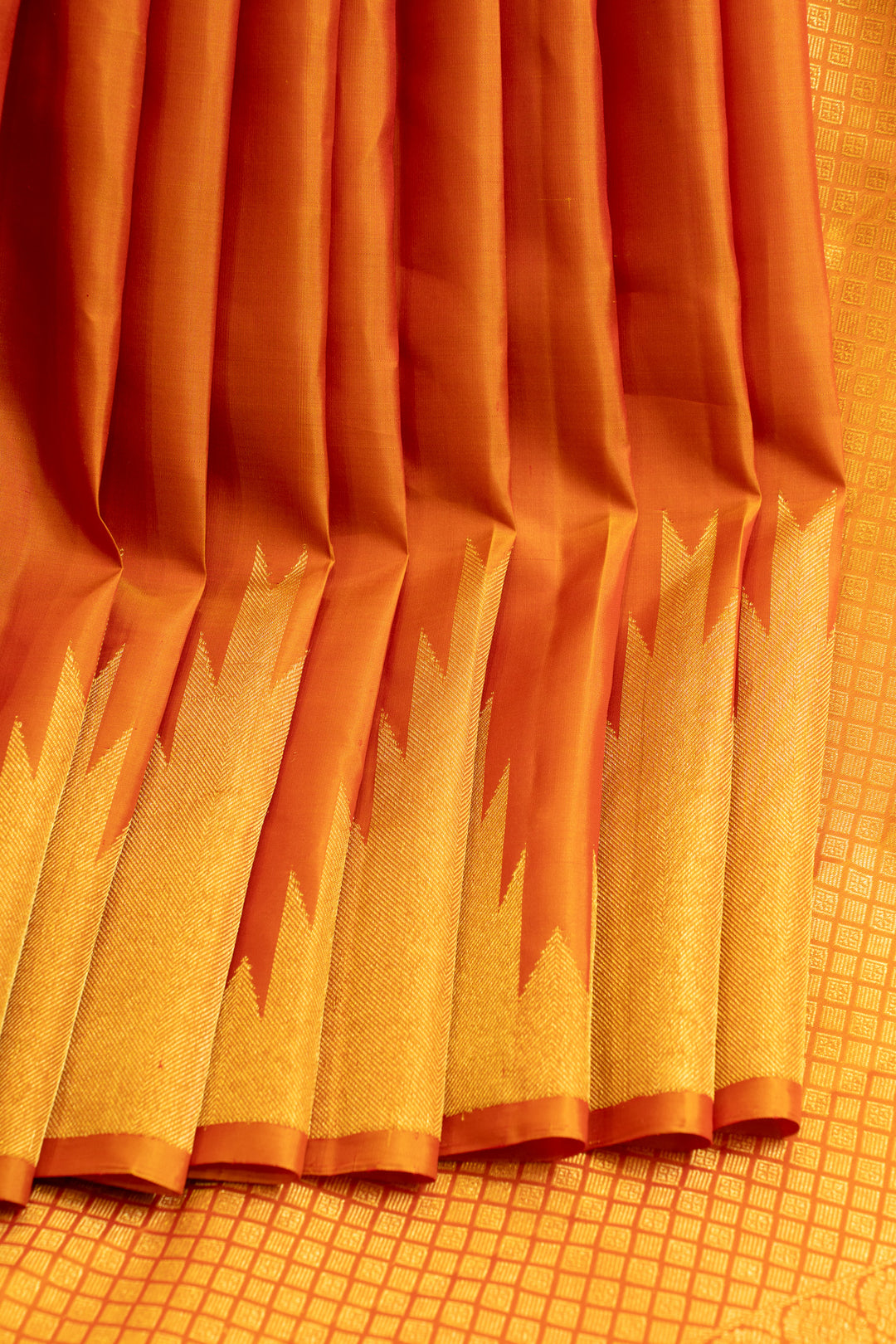 Rust orange temple border pure Kanchipuram silk saree