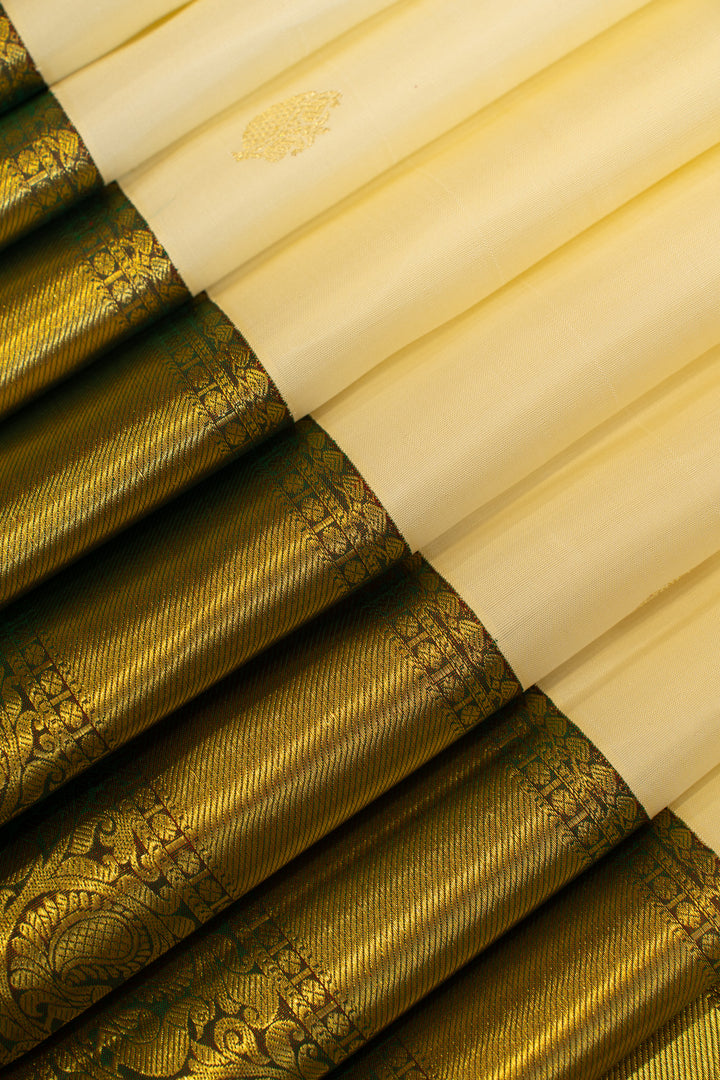 Pearl white and mandhulir green traditional pure Kanchipuram silk saree