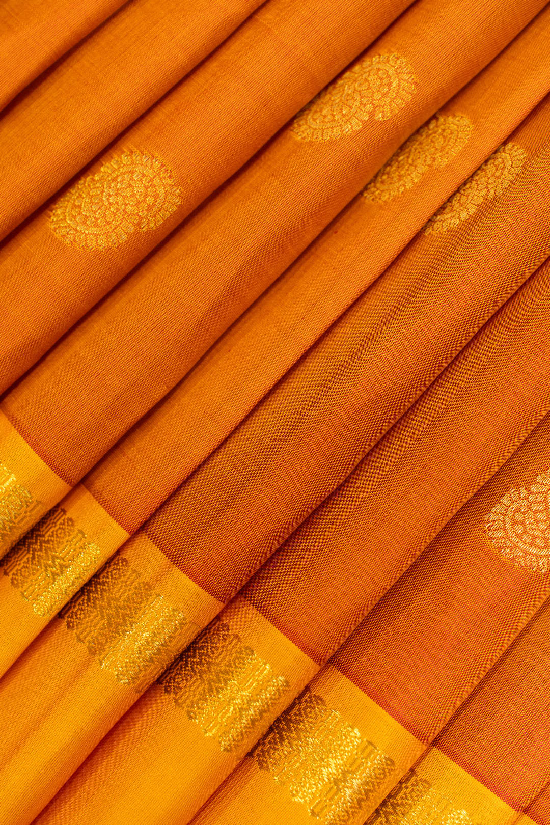 Rust orange and yellow rettai pettu pure Kanchipuram silk saree