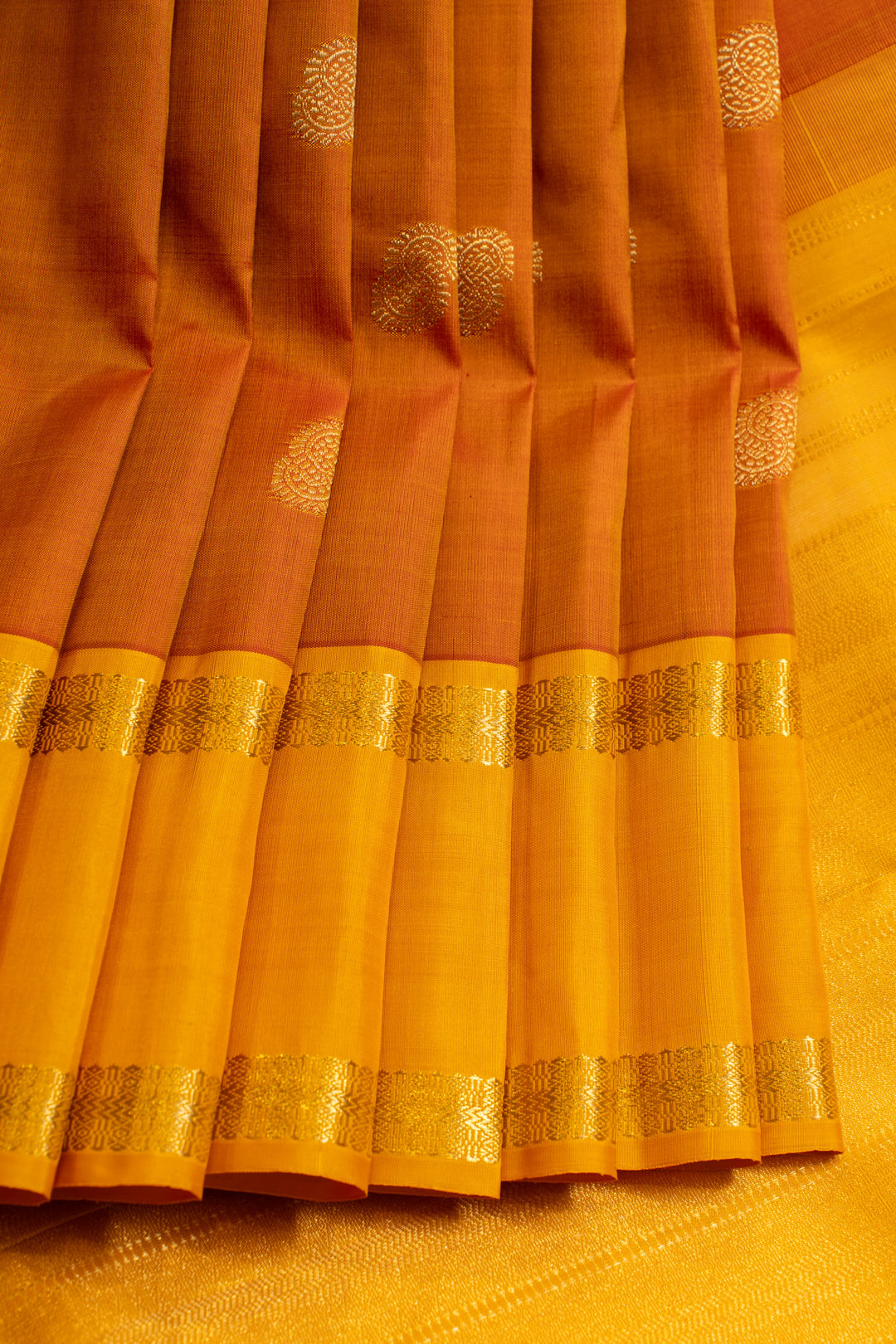 Rust orange and yellow rettai pettu pure Kanchipuram silk saree