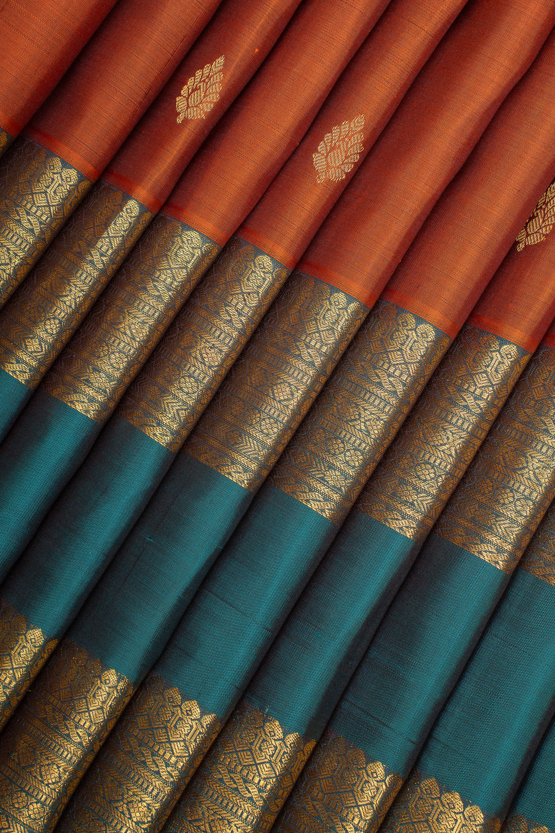 Rust Orange and Peacock Blue Pure Kanchipuram Silk Saree