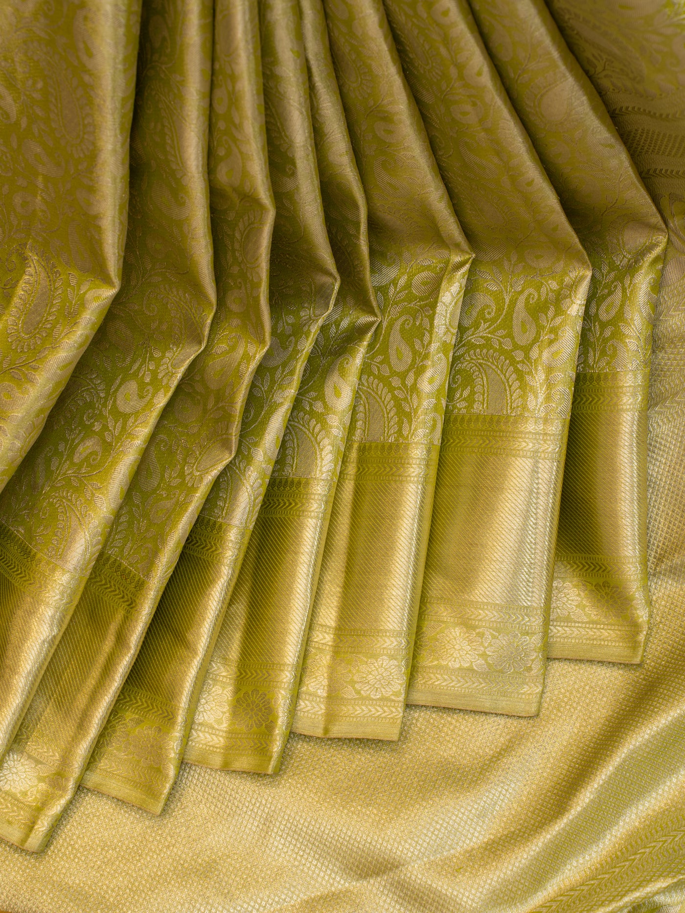 Pastel green paisley floral tissue pure Kanchipuram silk saree