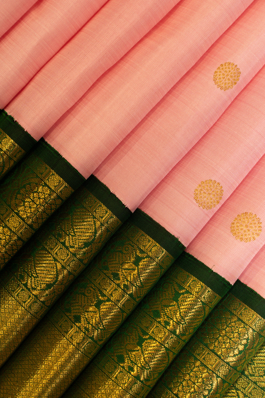 Pastel pink and bottle green traditional pure Kanchipuram silk saree