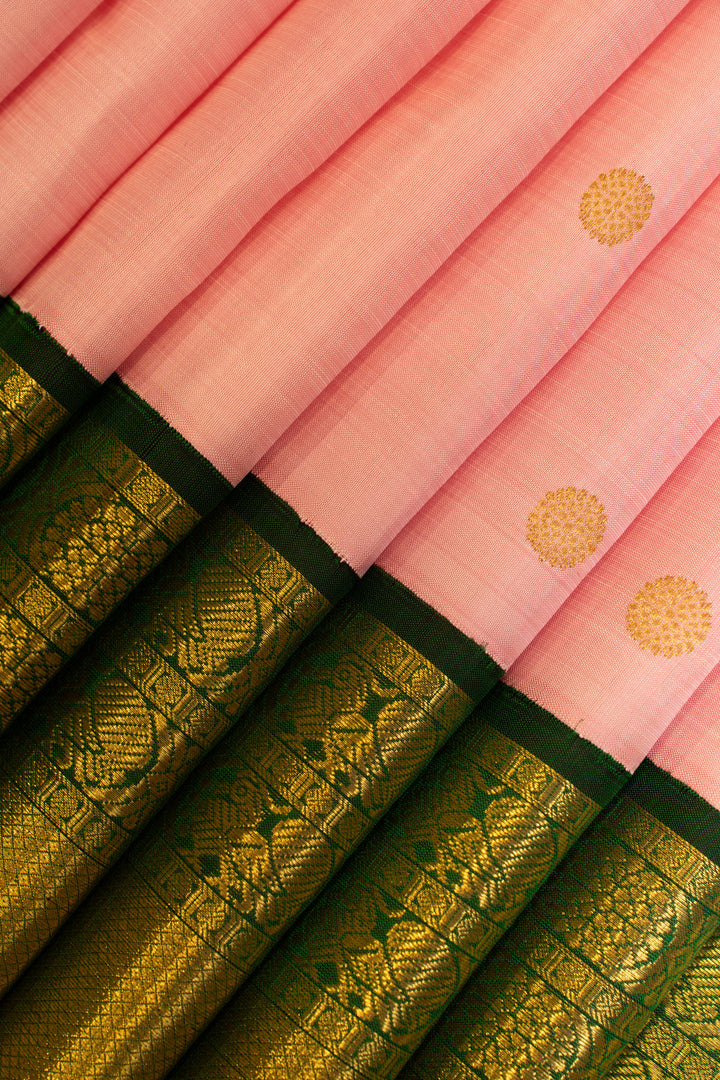 Pastel pink and bottle green traditional pure Kanchipuram silk saree