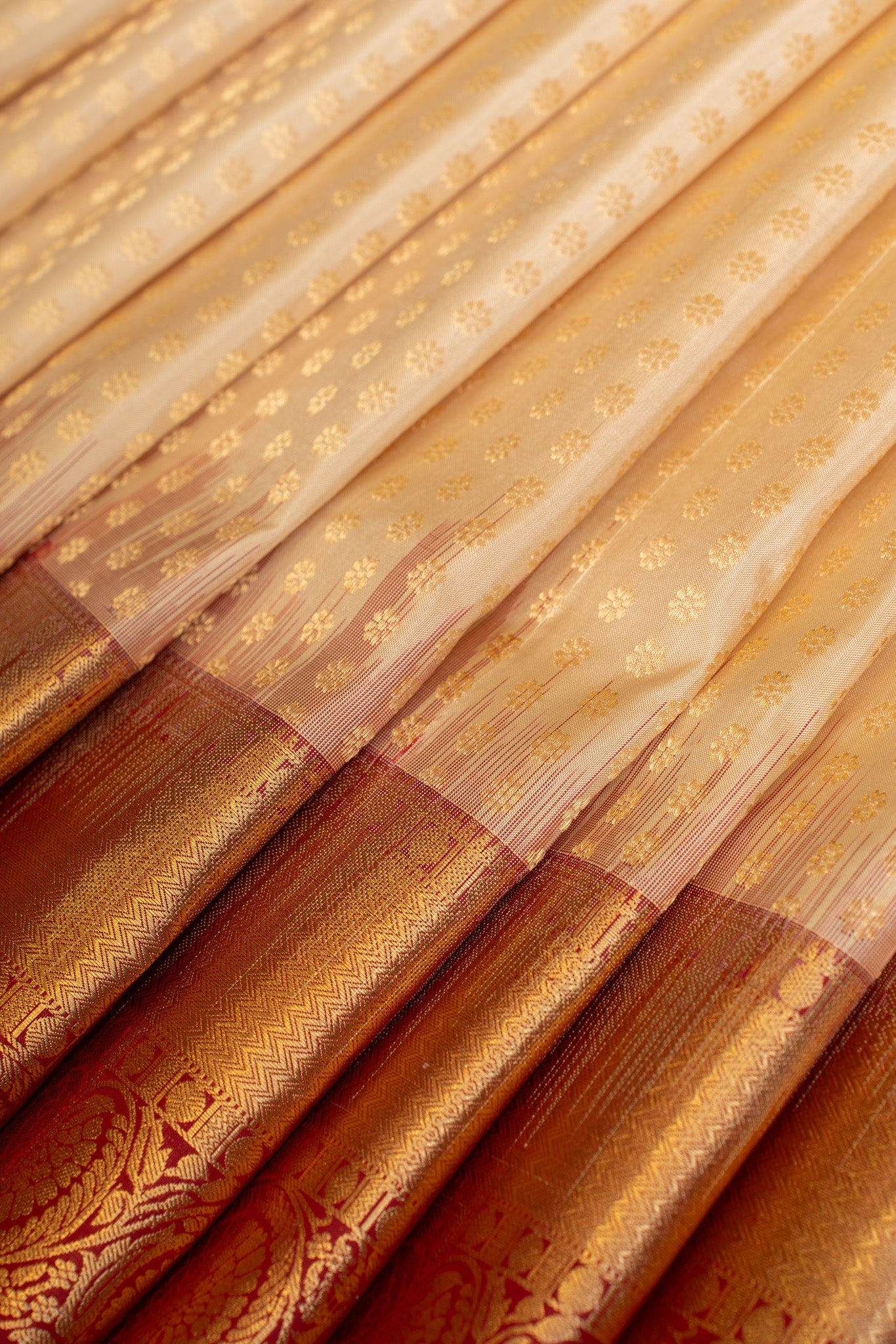 Pearl white and maroon lakshabutta pure Kanchipuram silk saree